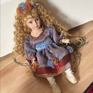 Elegant Porcelain Doll with Blue Dress